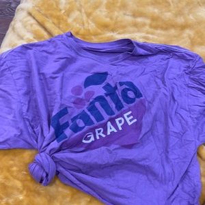 3X purple Fanta, depending on your chest size could be a crop top